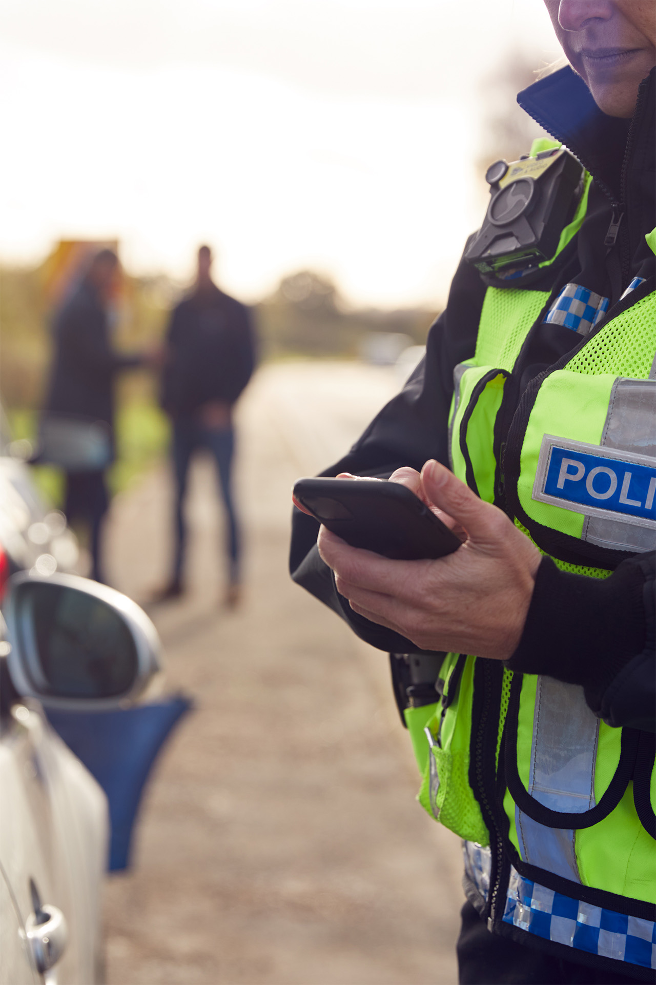 female-traffic-police-officer-recording-details-of-2026-03-10-03-15-36-utc